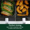 imageCuisinart Dual Basket Air Fryer Two Baskets Totals 11 QT 4 Function Air Fryer to Air Fry Roast Bake ampamp Keep Warm Features Sync Finish ampamp Settings Toss Reminder Automatic Warm Mode ampamp AutoPause11 Qt